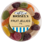 A circular plastic container which is filled with Fruit jellies confectionery. The lid of the tub has a sticker on it that is cream coloured and has the Romney's logo and words 'Fruit Jellies' on it.