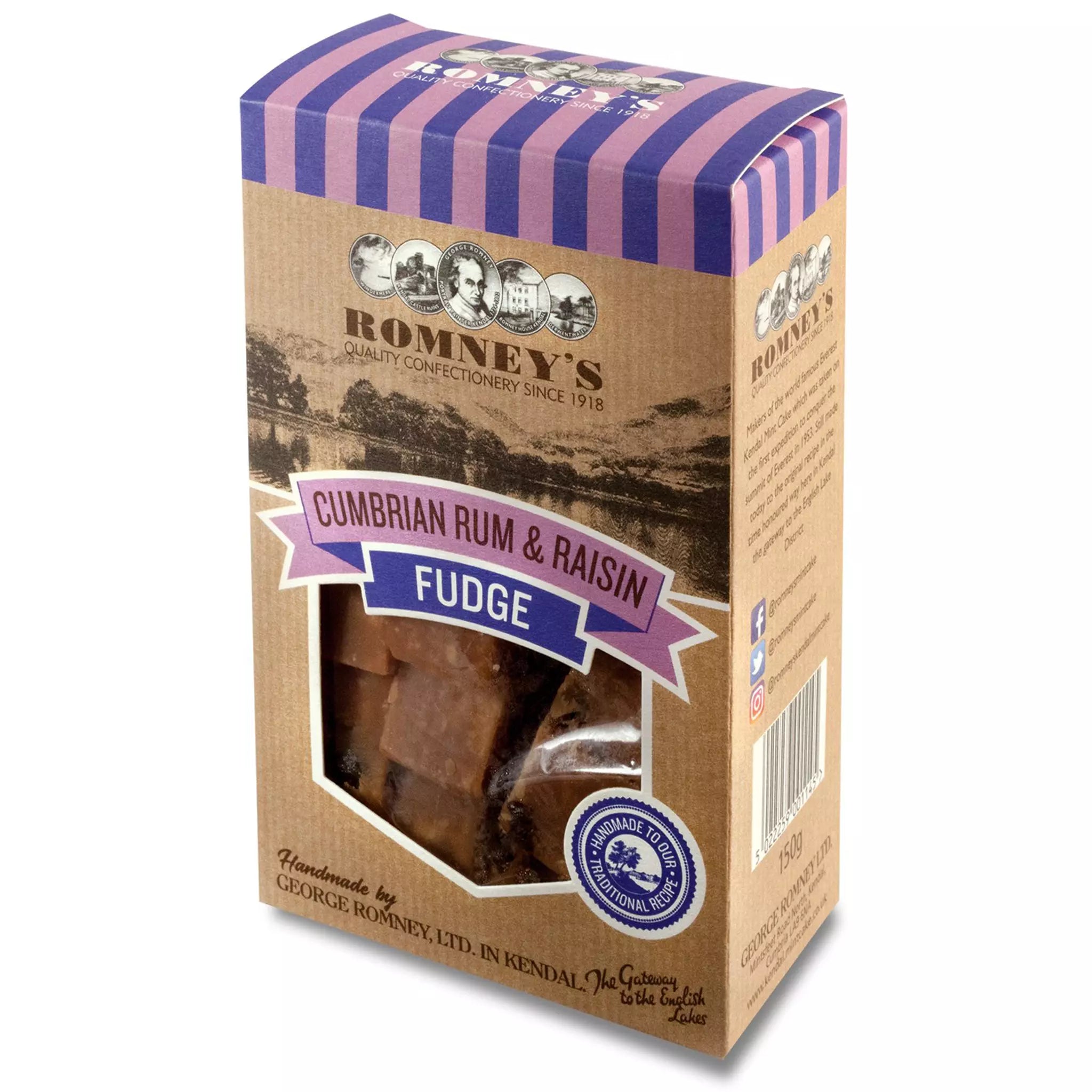 A rectangular cardboard box of fudge with a window cut out in the middle that shows fudge pieces in a wrapped bag. The top of the box has purple lines running down it. The box says 'Cumbrian Rum & Raisin Fudge'.