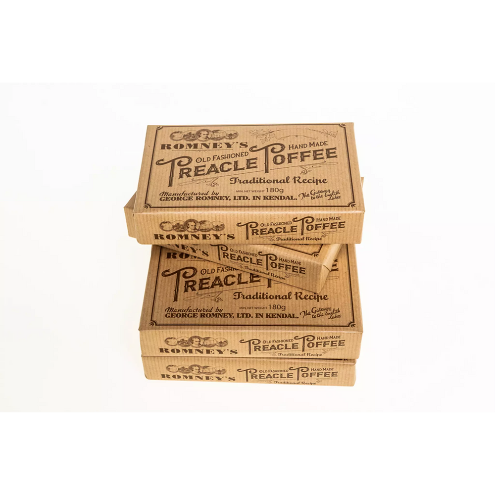 A pile of rectangular boxes wrapped in old fashioned style paper. The boxes are branded with the Romney's logo and the words 'Old Fashioned Hand Made Treacle Toffee' in a brown font.