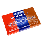 A rectangular cardboard box containing three bars of Kendal Mint Cake. The box is split into three different colours, red on the left, blue in the middle and brown on the right. The box features the Romney's logo and words 'Romney's triple pack Kendal Mint Cake' in a white font.