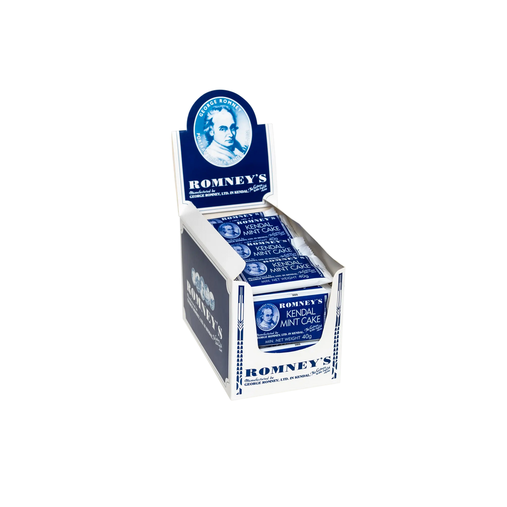 A product image showing an open cardboard box which is used to display products on a shelf and is white and blue. The box contains 40g bars of Romney's White Kendal Mint Cake which is in a blue and white wrapper.