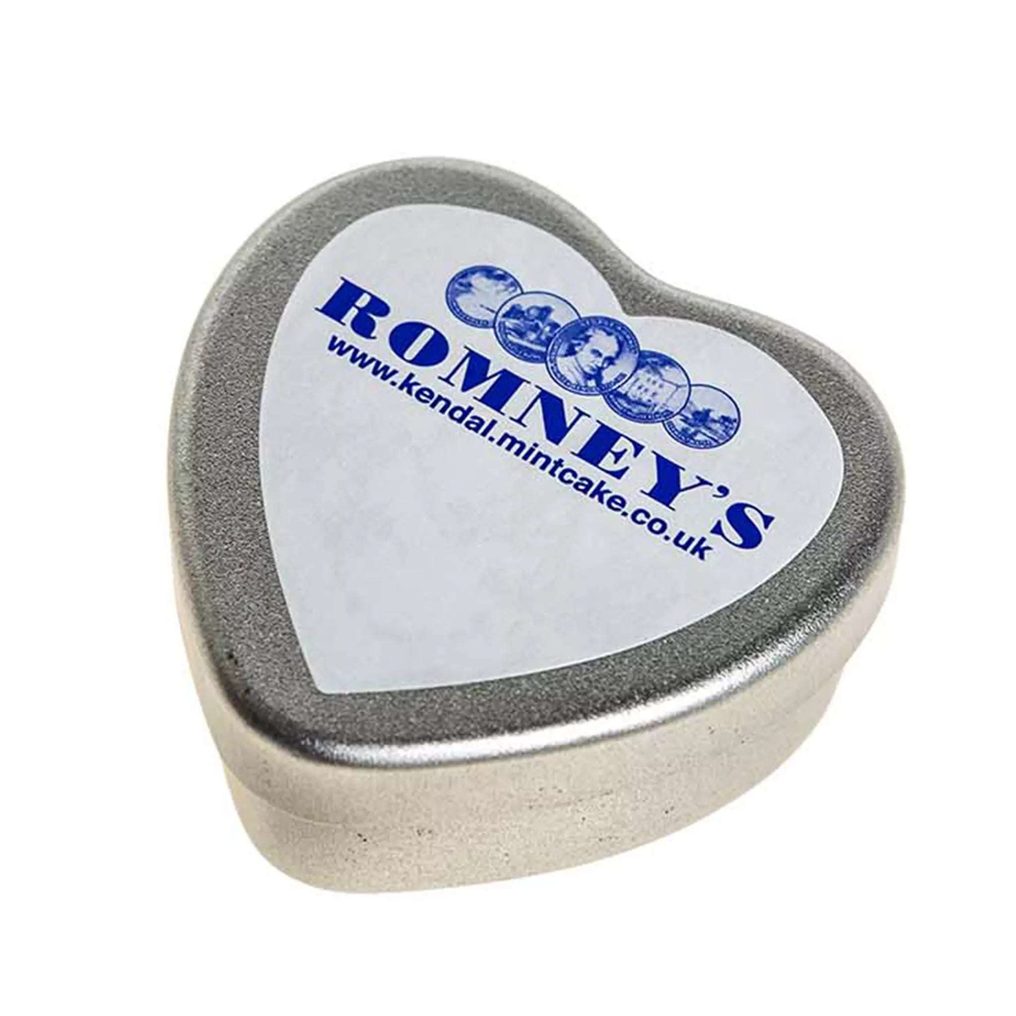 A heart shaped tin contains a heart shaped chocolate coated Kendal Mint Cake. The lid has a white heart shaped sticker on it featuring the text 'Romney's'. the website URL & Romney's logos in a blue font.