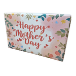 a box wrapped in a flowery mother's day themed paper, featuring a large message on the front reding 'Happy Mother's Day'.