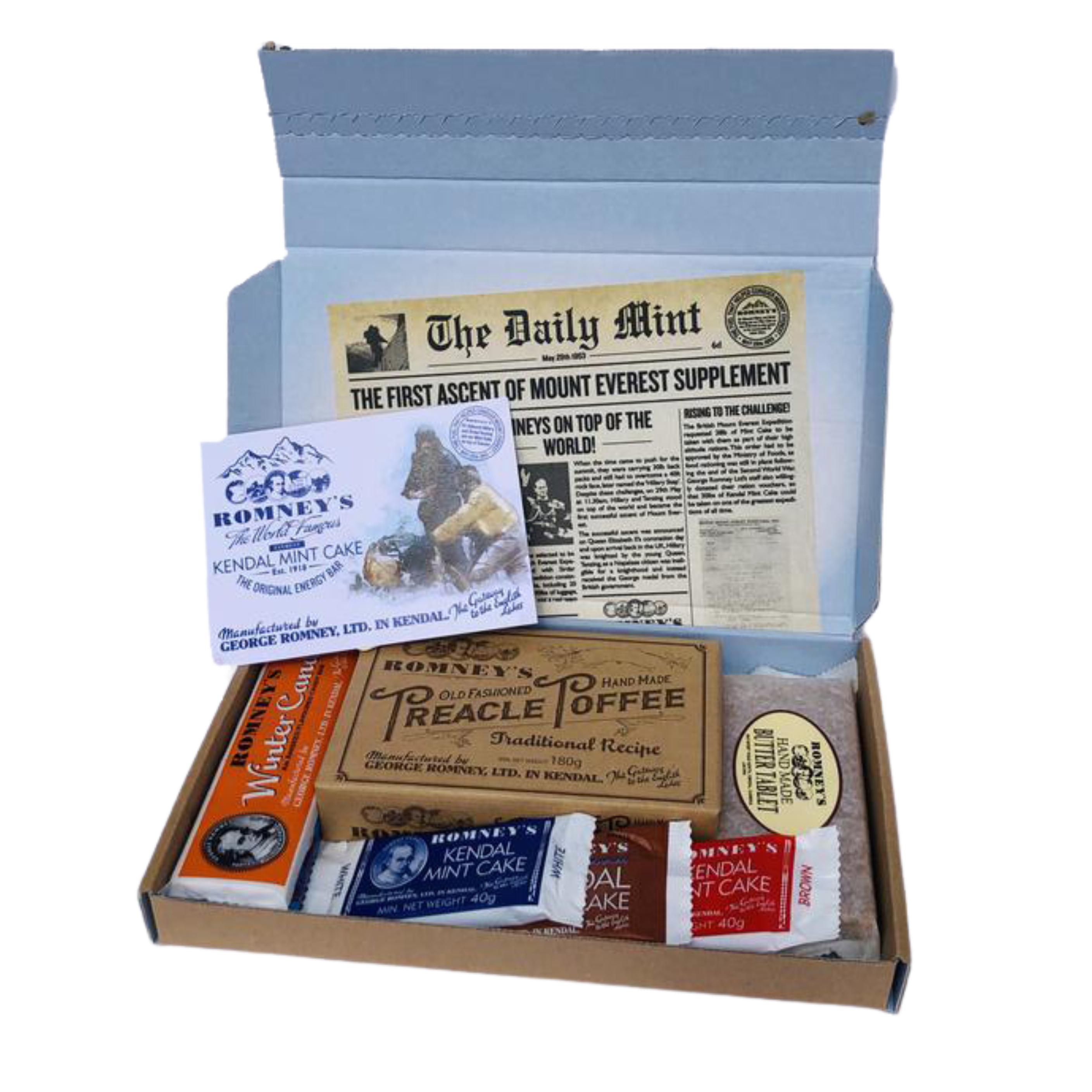 An open rectangular cardboard box containing a variety of Romney's confectionery products such as: rum and butter bar, winter candy bar, 40g white kendal mint cake, 40g brown kendal mint cake, 40g chocolate coated kendal mint cake, butter tablet bar, box of old fashioned treacle toffee