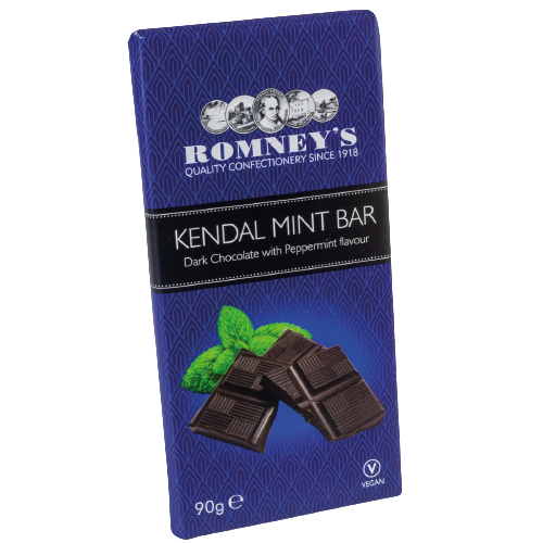 A rectangular bar of chocolate wrapped in a dark blue wrapper that features a repeating pattern. The front of the wrapper features the Romney's logo. A black band wraps around the middle of the bar and states 'Kendal Mint Bar' & 'Dark Chocolate with Peppermint Flavour'. The front of the wrapper also features an image of broken pieces of chocolate and mint leaves.