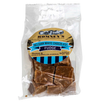 A transparent bag containing pieces of Fudge. The bag has a label on it that shows Romney's logo and says 'Belgian White Chocolate Fudge'.