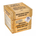 A closed box designed to look like a wooden crate. The font is black and a spray paint stencil. The front panel has the words 'supplied by: George Romney Ltd. Kendal Mint Cake' and 'www.everest70.com'. The front panel also features the Everest 70 logo as a sticker.