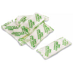 A pile of White Kendal Mint Cake individually wrapped in a transparent wrapper.