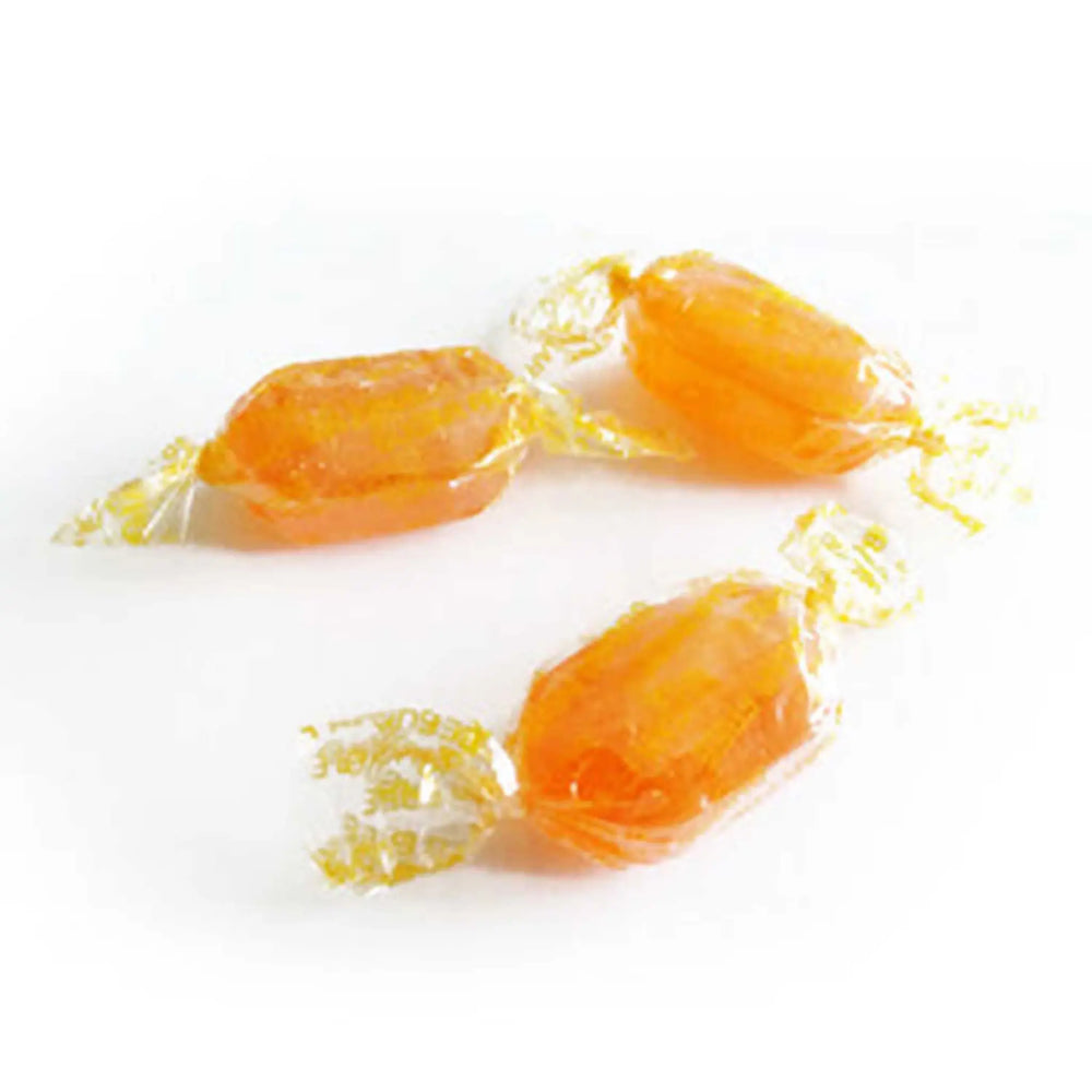 Three Barley Sugar sweets individually wrapped in a transparent wrapper