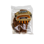 A transparent bag containing pieces of Fudge. The bag has a label on it that shows Romney's logo and says 'Cointreau & Orange Fudge'.