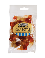 A transparent rectangular bag containing cola bottle sweets