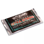 A rectangular Extra Strong White Kendal Mint Cake bar wrapped in a foil wrapper that is silver and black. It features the Romney's logo and words 'Romney's Kendal Mint Cake' in silver and the words 'Extra Strong' in red and green.