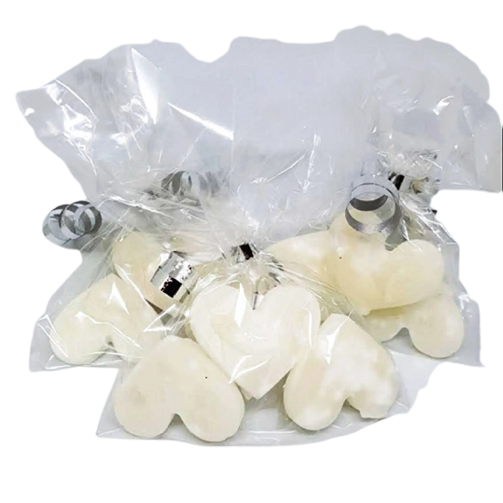 three transparent bags each containing three white kendal mint cake pieces in the shape of a heart. the bags are tied with a silver ribbon